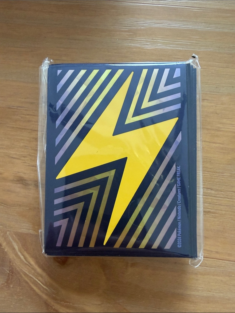 Sealed Lightening Bolt Surging Sparks Card Sleeves (x65) from Pokemon TCG ETB